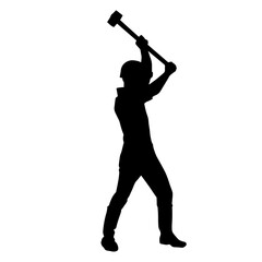 Silhouette of a worker in action pose using his sledge hammer tool.