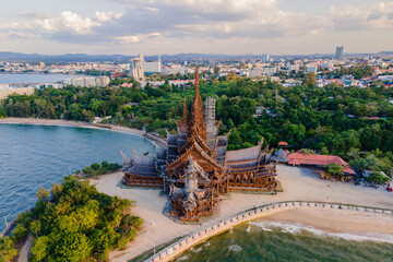 Drone aerial view at The Sanctuary of Truth wooden temple in Pattaya Thailand is a gigantic wooden...