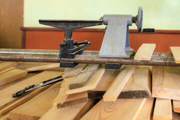 A machine in a carpenter's workshop. Background with selective focus and copy space