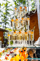 A Table Filled With Glasses of Sparkling Champagne