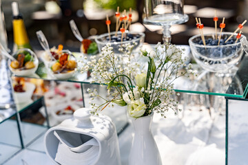 A Beautiful Table with a Vibrant Vase of Fresh Flowers