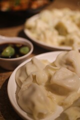 Chinese traditional dumplings and laba garlic, photoed in Jinguyuan, a famous dumpling restaurant in Beijing
