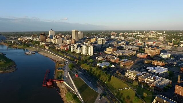 Memphis Cityscape in Tennessee.  Mississippi River Barge Hernando de Soto Bridge and Trafic in Background. Drone