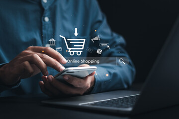 Online shopping concept. Businessman using smartphone with online shopping to digital cart from...