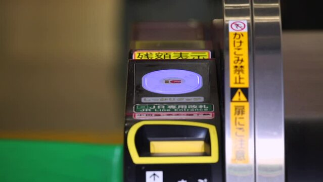 Shinjuku Ticket Gates in Tokyo Metro. Pasmo Card or Suica Card. People Taping Card to go Through the Gate. Tokyo Underground Metro Network