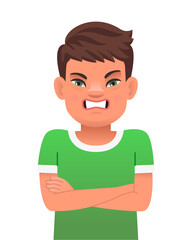 An angry, disgruntled little boy with the genetic disease Down Syndrome stands with his arms crossed. The sunny child.