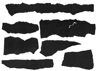 Set of pieces of black crumpled paper on a blank background.