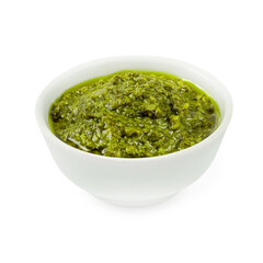 Pesto sauce, on a wooden board, on a white background