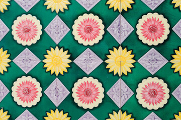 Cultural Kaleidoscope: majolica patterns painting the past on a shophouse with a centennial palette...