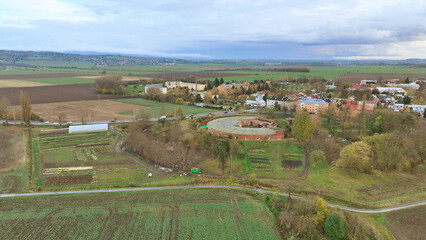 Obraz premium Bio farm autumn farming potato harvest Solanum tuberosum cabbage Brassica oleracea capitata Ipomoea batatas sweet leaves leaf color, agricultural farm garden farmer fruit tree drone aerial lettuce