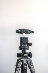 Camera tripod isolated on white background.