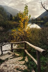 Fototapeta premium Autumn view of Ghirla lake in province of Varese, north Italy