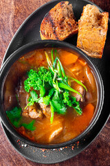 Shurpa soup with lamb meat in bowl