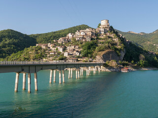 The village of Castel di Tora on Lake Turano in the province of Rieti in Lazio, Italy - 697254134