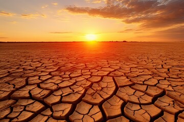 Harsh reality of dry and arid environment likely affected by drought and adverse climate conditions. Cracked and broken terrain reflects impact and lack of water creating barren and landscape
