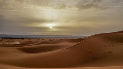 Fototapeta na wymiar 02_Sunrise of the famous and legendary dunes of Erg Chebbi in the Sahara Desert, Morocco.
