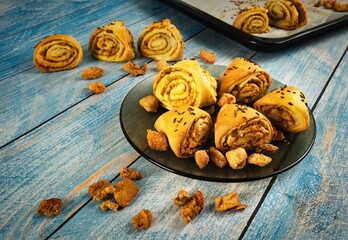 Cracked snails with sourdough on a blue table