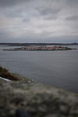 Landscape shot with a view of an island. Taken from a barren rock, you can see over the coast and...