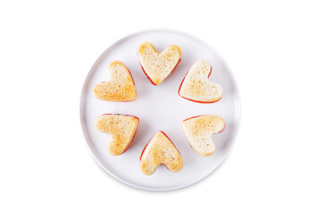 Sausage tomato cheese canapes in the form of heart for Valentine's day holiday on a white isolated background