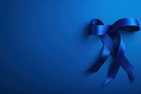 A striking dark blue ribbon on a blue background , raise awareness of colon cancer awareness .