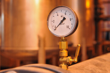 Pressure gauge in a water supply system at a factory. industrial concept. boiler room equipment -...