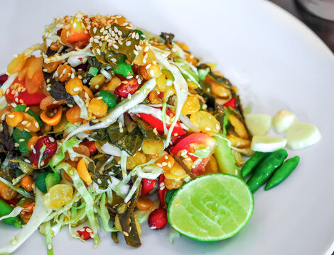 Burmese tea leaf salad called Lahpet thoke recipe.