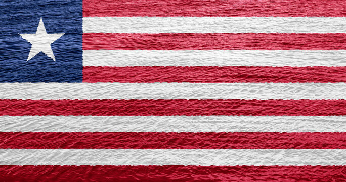 Flag of Republic of Liberia on a textured background. Concept collage.