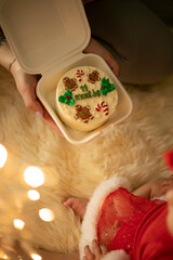 Top image of  a bento cake celebration 11 months on christmas holiday.