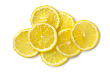 Heap of fresh raw juicy lemon slices close up isolated on white background
