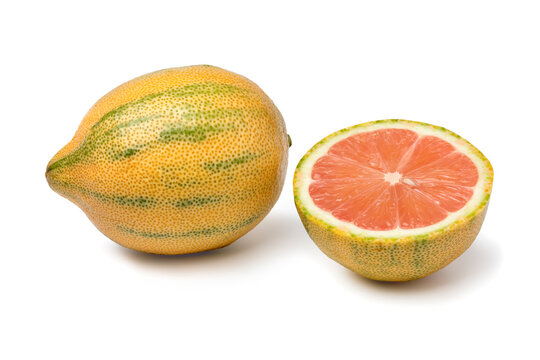 Whole and halved tiger lemon isolated on white background close up
