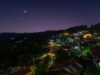 CHIANG RAI - THAILAND - December 16, 2023: Night time of peaceful village on the mountain at border...