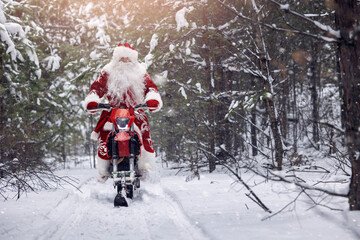 Concept delivery gift for Christmas holiday. Santa Claus in red cloth riding on snow bike,...