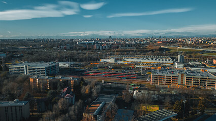 View fashion capital Milan against a blue sky from a drone in December. Drone view of Milan from...