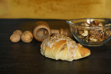 Fresh traditional polish pastry with white poppy-seed filling and nuts. St. Martin's croissant,...