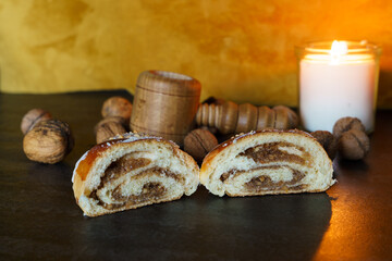 Fresh traditional polish pastry with white poppy-seed filling and nuts. St. Martin's croissant,...