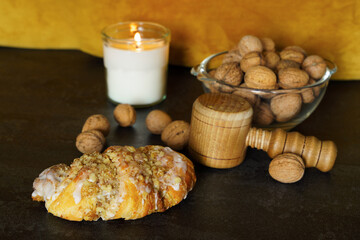 Fresh traditional polish pastry with white poppy-seed filling and nuts. St. Martin's croissant,...