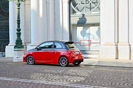details of red and gray two-tone Fiat Abarth 595 Turismo car
