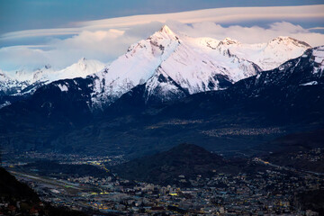 City of Sion in Valais, Switzerland, winter mountain landscape - 697374148
