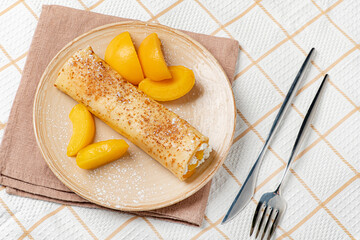 pancake with whipped cream and peach