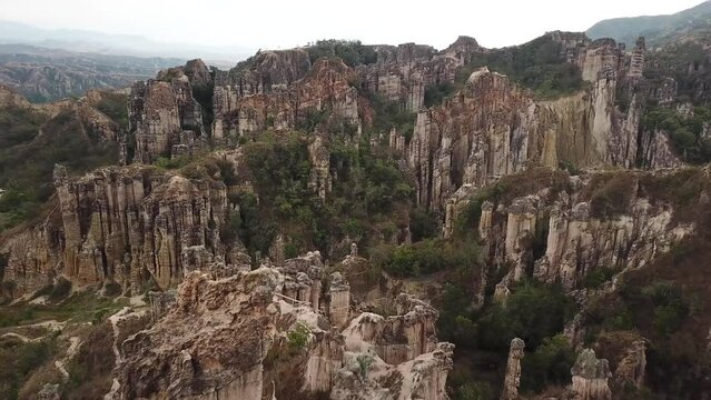 Aerial drone footage of Los Estoraques Unique Natural Area, Colombia, Latin America. Beautiful colombian sharp rocks. Beautiful landscape in the Norte de Santander region of Colombia. 4K footage.
