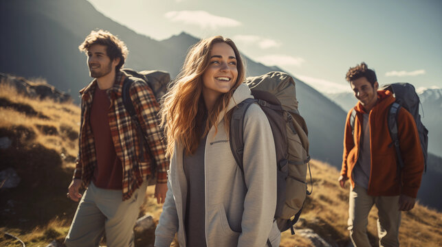 Group of friends hiking together outdoors exploring the wilderness 