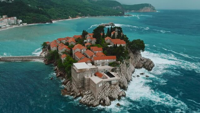 Sveti Stefan. Montenegro. Fantastic aerial view of the beach and Sveti Stefan island. Beautiful architecture and the blue Adriatic Sea.