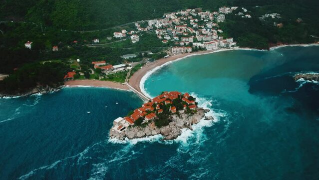 Sveti Stefan. Montenegro. Fantastic aerial view of the beach and Sveti Stefan island. Beautiful architecture and the blue Adriatic Sea.