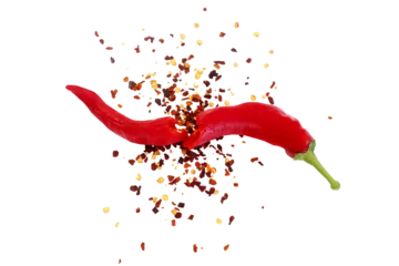 Fotobehang organic kashmiri red chili pepper with chili pepper flakes powder burst texture,cutout transparent background,png format © gv image