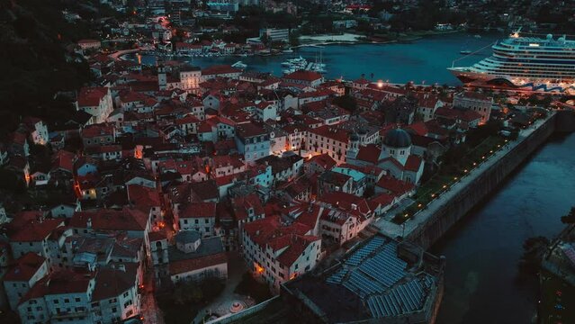 Fly over the evening Kotor city, aerial view,Montenegro