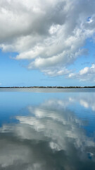 Blue Sky and Cloud Reflections in Water in Florida Keys