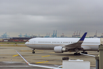 Passenger plane is taxiing on runway as it prepares to depart