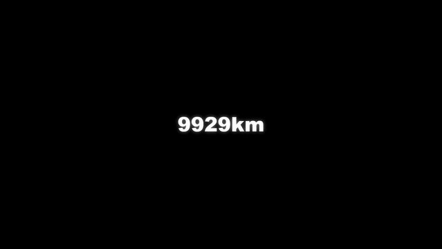 Animation of number counting up to 10000km. Kilometer counter. Increasing digits on black background and green screen background. 