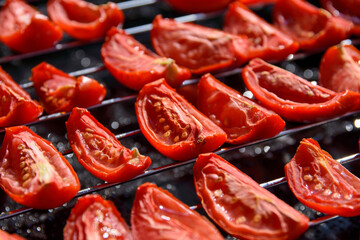 Tomatoes sliced and dried under the sun for drying