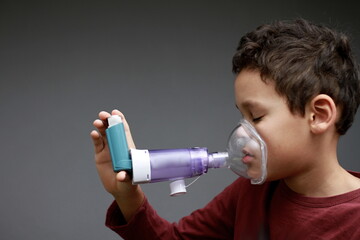child with flu and inhaler respiratory puff on grey background with people stock image stock photo  - obrazy, fototapety, plakaty
